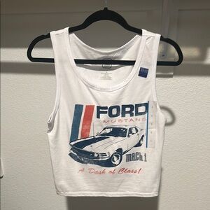 Pick 5 tee/top for $20

Ford White and Blue Crop Top